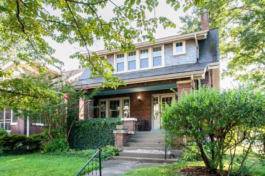 Highlands Haven, a brick Craftsman with a shaded front porch in Louisville, Kentucky