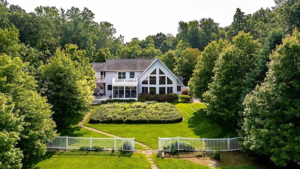 Lakefront A-Frame Estate, a Home Base home with private beach in South Haven
