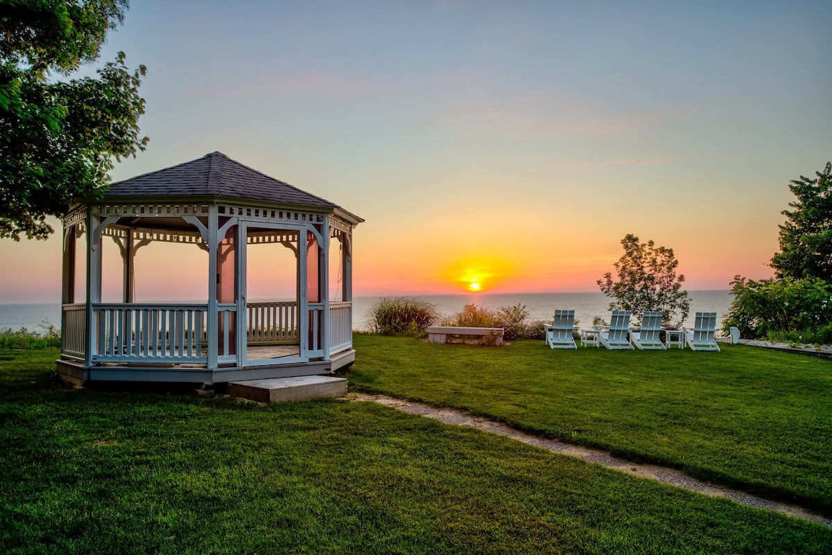 A lakeside gazebo at sunset at a Home Base home in South Haven
